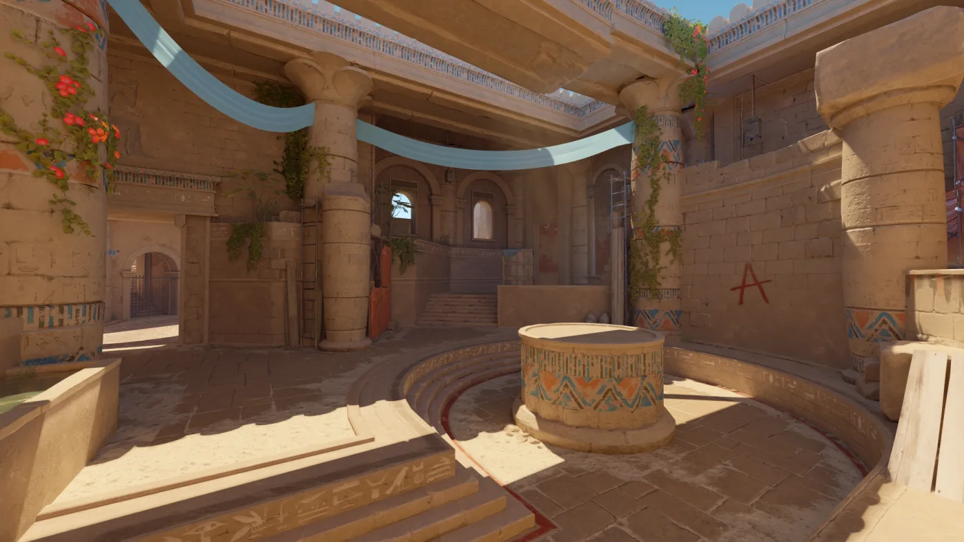 A wide shot of de_anubis in Counter-Strike 2, showing the sandstone architecture and open sightlines of the map