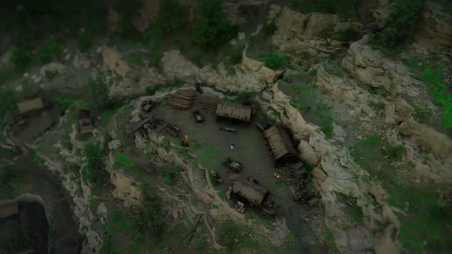 Aerial view of Timberham Sawmill in Crimson Desert, with timber stacks and work sheds on a rocky ledge