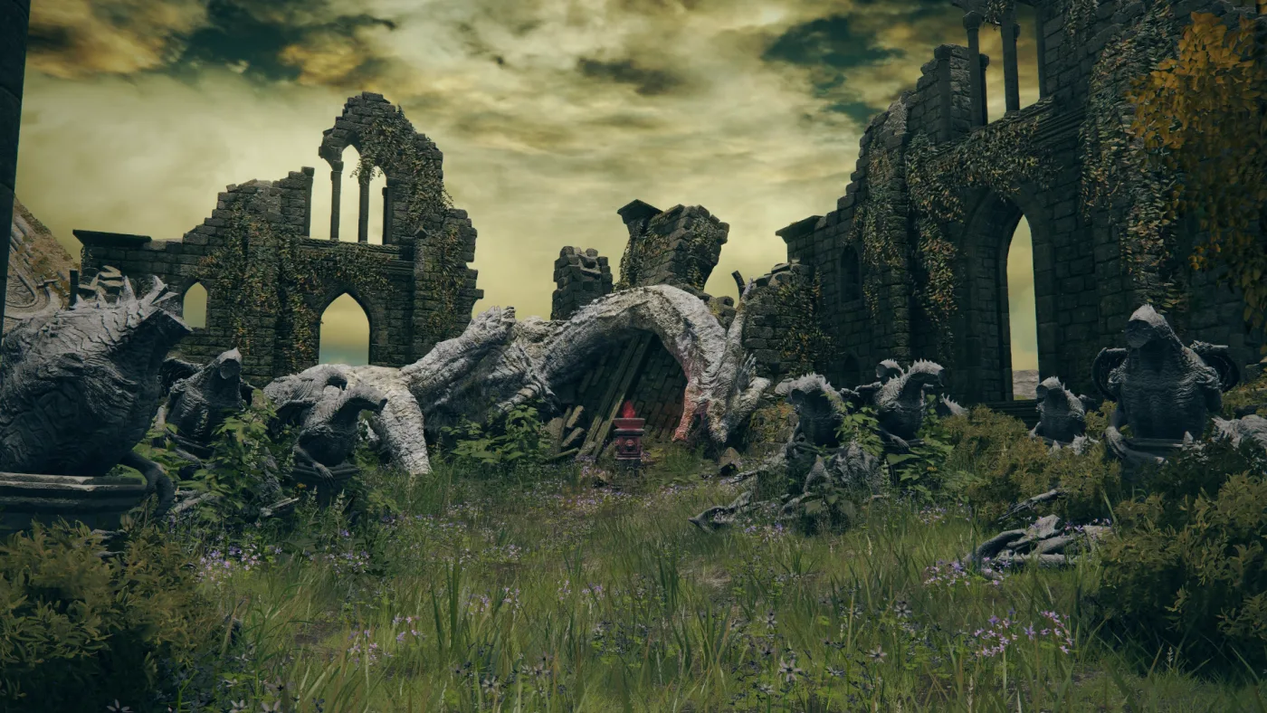 The Church of Dragon Communion in Elden Ring: a roofless ruined church where the grey stone corpse of a dragon arches across the grassy floor, a small altar with a red flame sits beneath it, and stone dragon statues line both sides.