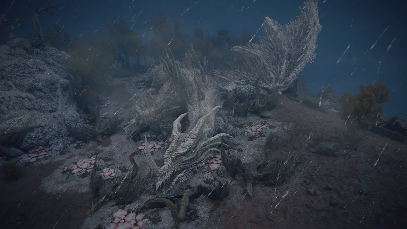 Elder Dragon Greyoll in Elden Ring: a colossal grey-white dragon lying on a dark hillside in Dragonbarrow at night, rain falling, pale pink flowers scattered around her.