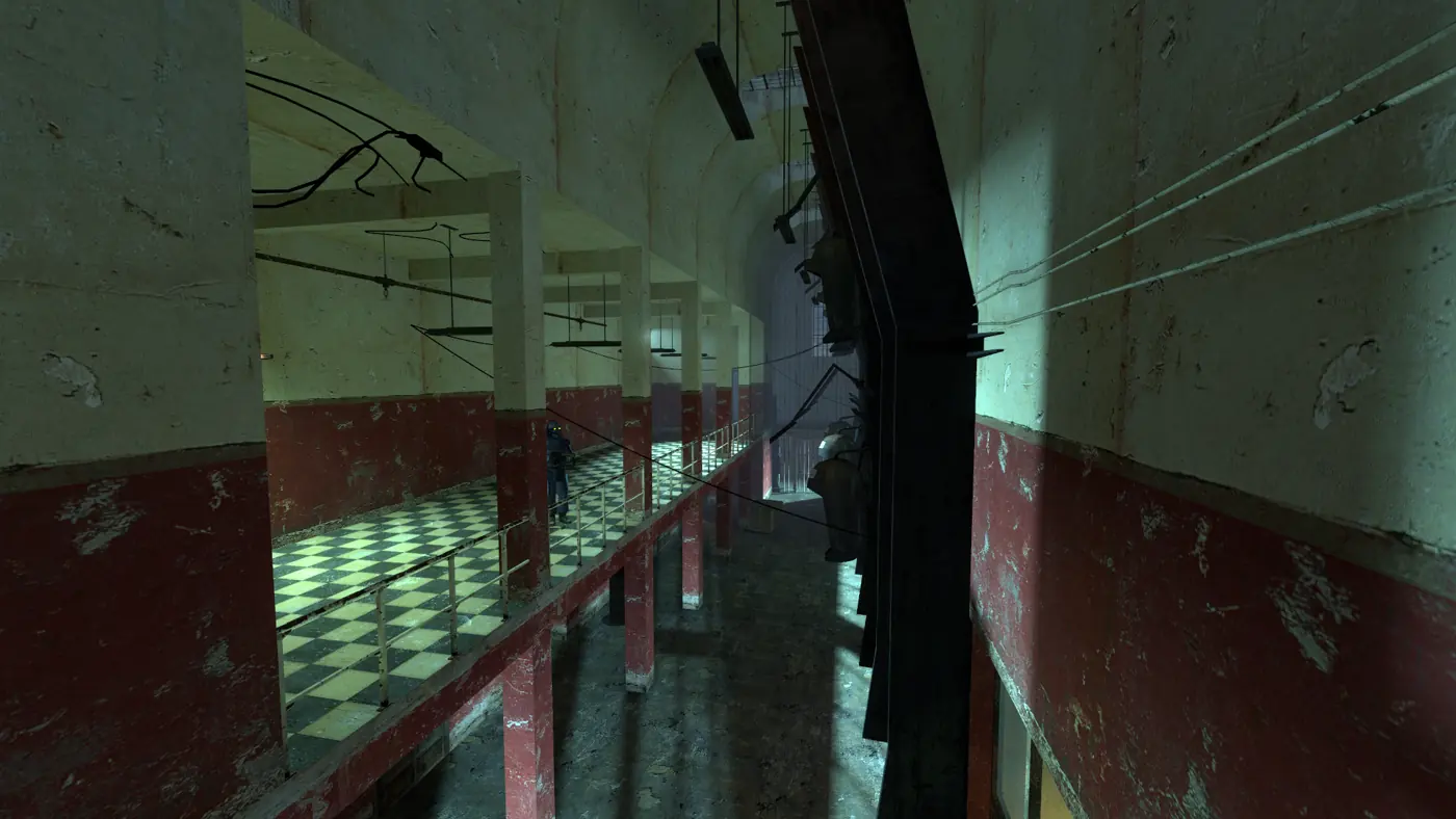 Cell block D8 in the Depot: a two-storey block with red and cream walls, a checkered walkway with metal railings, a Combine soldier patrolling the upper level, and a rack of Combine prisoner pods hanging on the right.