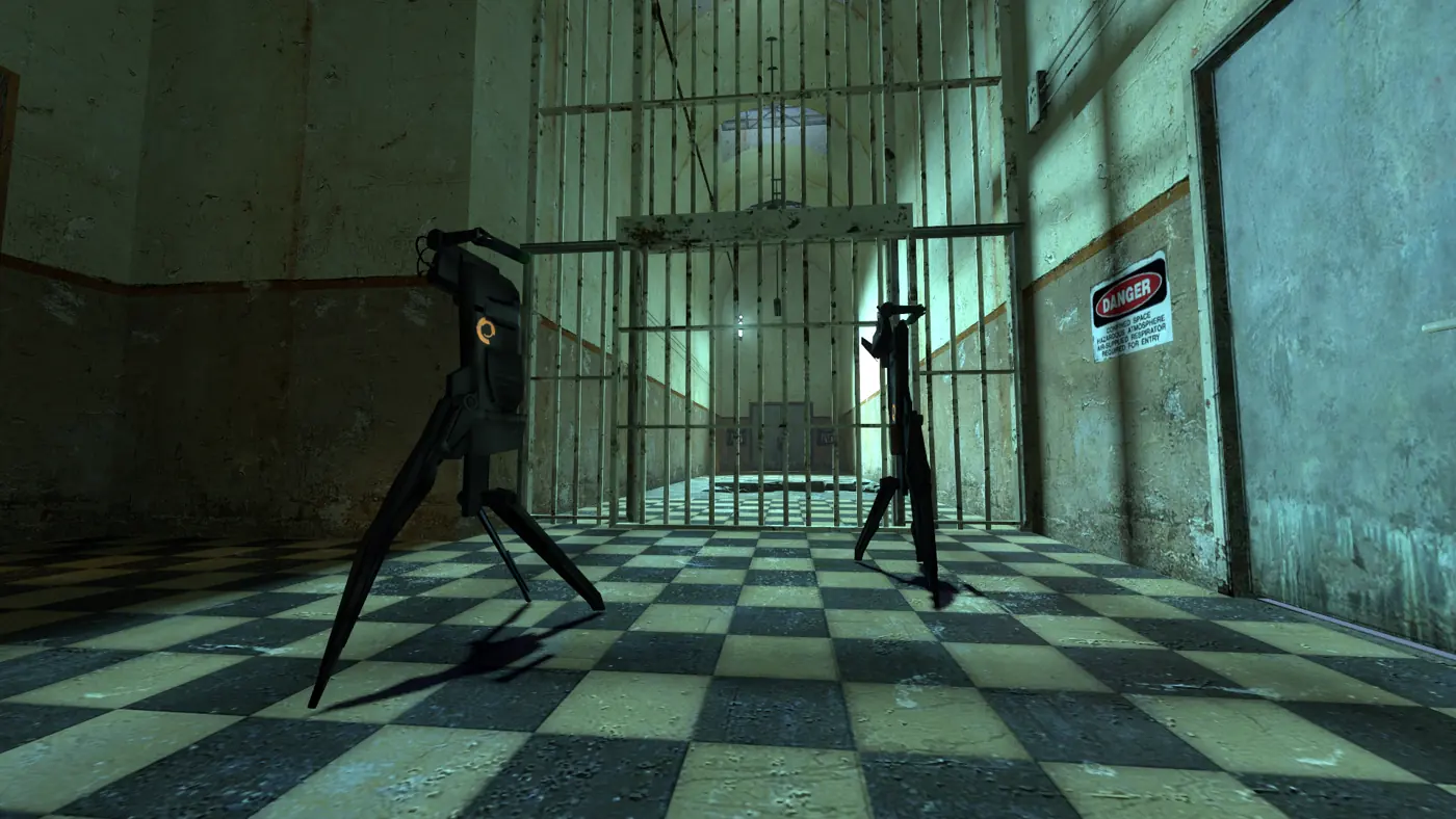 Two Combine Sentry Guns standing on their tripods in a barred Nova Prospekt corridor with a black-and-cream checkered floor and a DANGER sign on the wall.