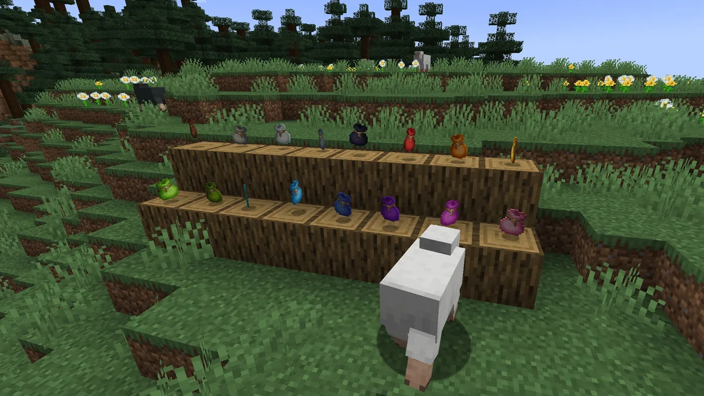 Dyed Minecraft bundles in many colours displayed in item frames across two stepped wooden shelves in a forest, with a sheep standing in front of them.