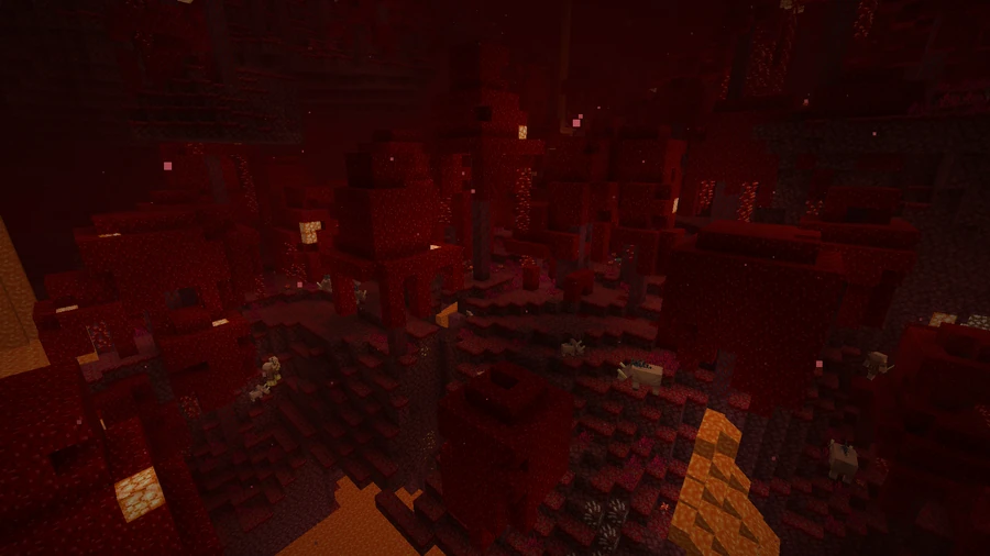 A crimson forest in the Nether — red fungus, weeping vines, and the warm haze where hoglins and piglins roam.