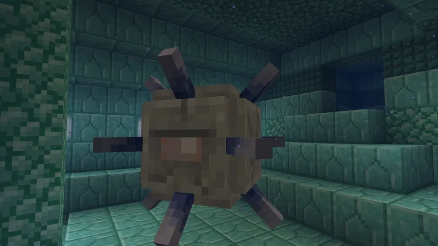 An elder guardian inside an ocean monument — the large spiked fish-like mob that applies Mining Fatigue III to everything nearby.