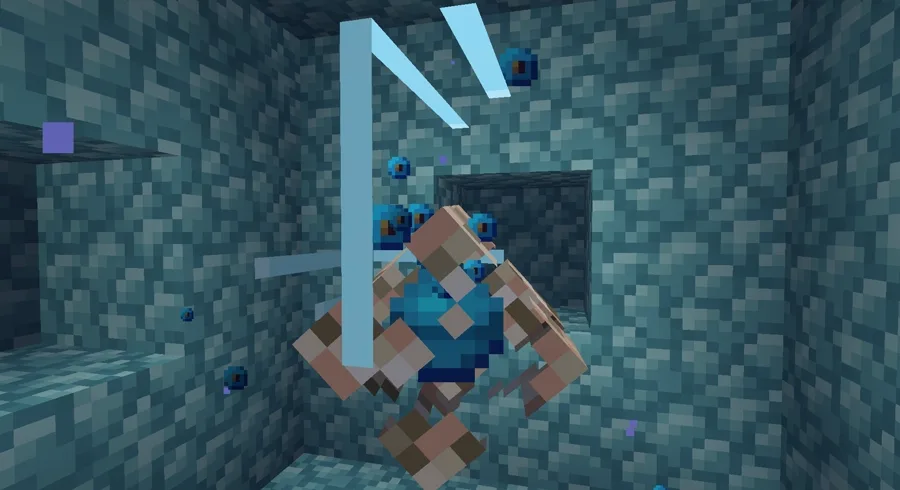 An activated Minecraft conduit glowing inside its prismarine frame, surrounded by water.