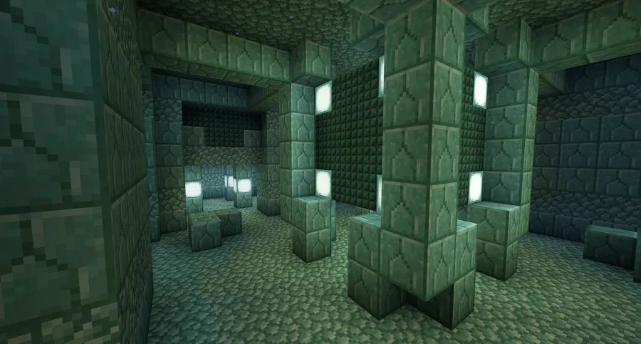 A monument sponge room with wet sponges on the ceiling, alongside the treasure chamber's gold blocks encased in dark prismarine.