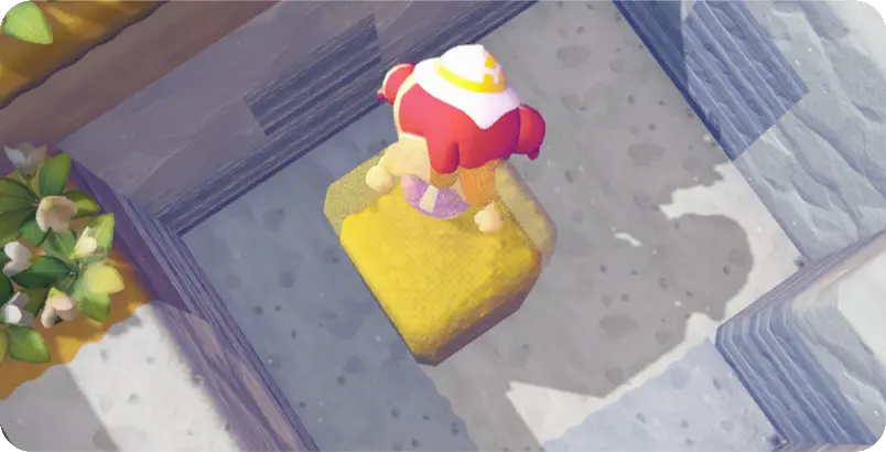 A Pokopia tip screen showing Ditto placing items and materials directly at its feet while building.