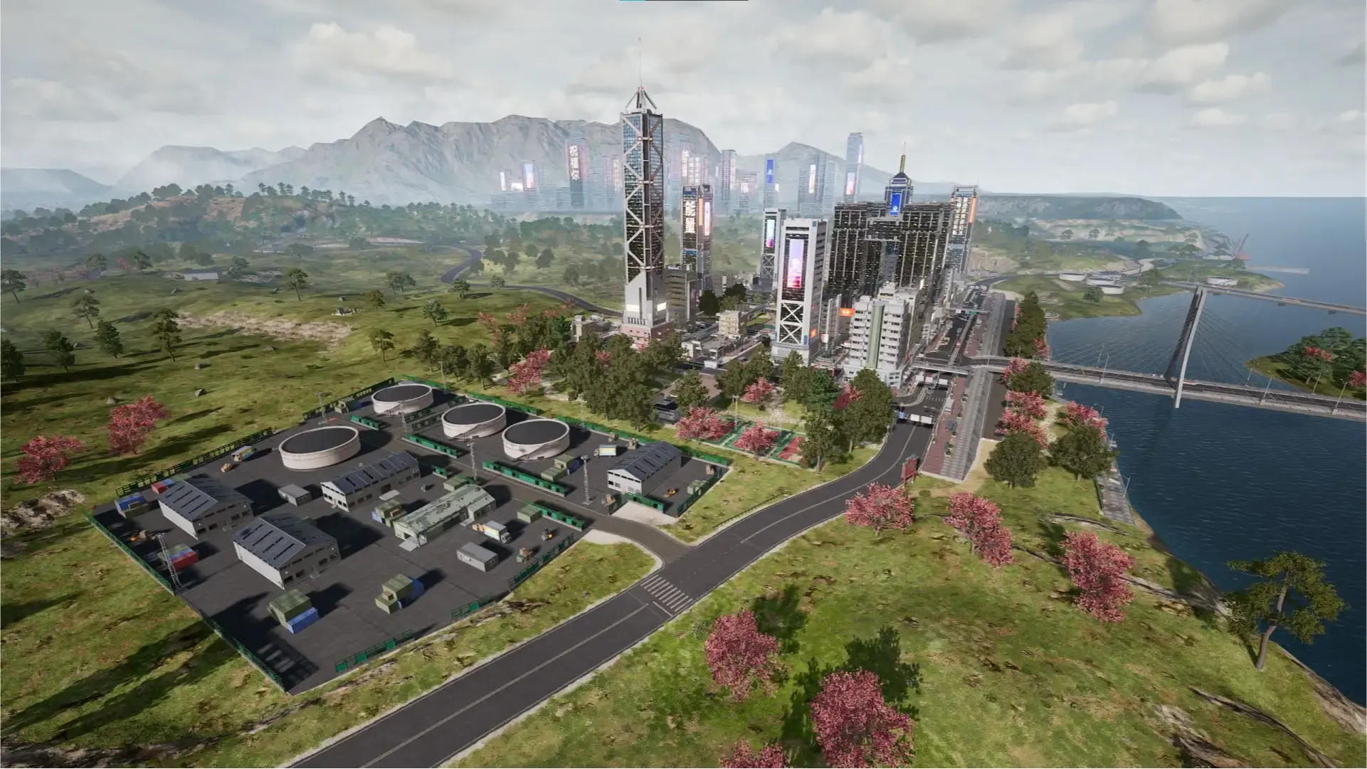 Rondo's Jadena City — a modern skyline of skyscrapers and a long bridge, with an industrial/factory complex in the foreground and mountains behind.