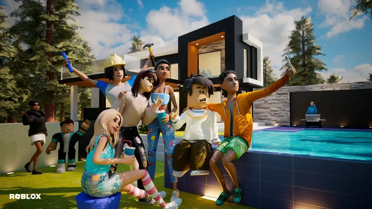 A group of five stylized Roblox avatars taking a selfie together beside a modern poolside house, capturing group play.