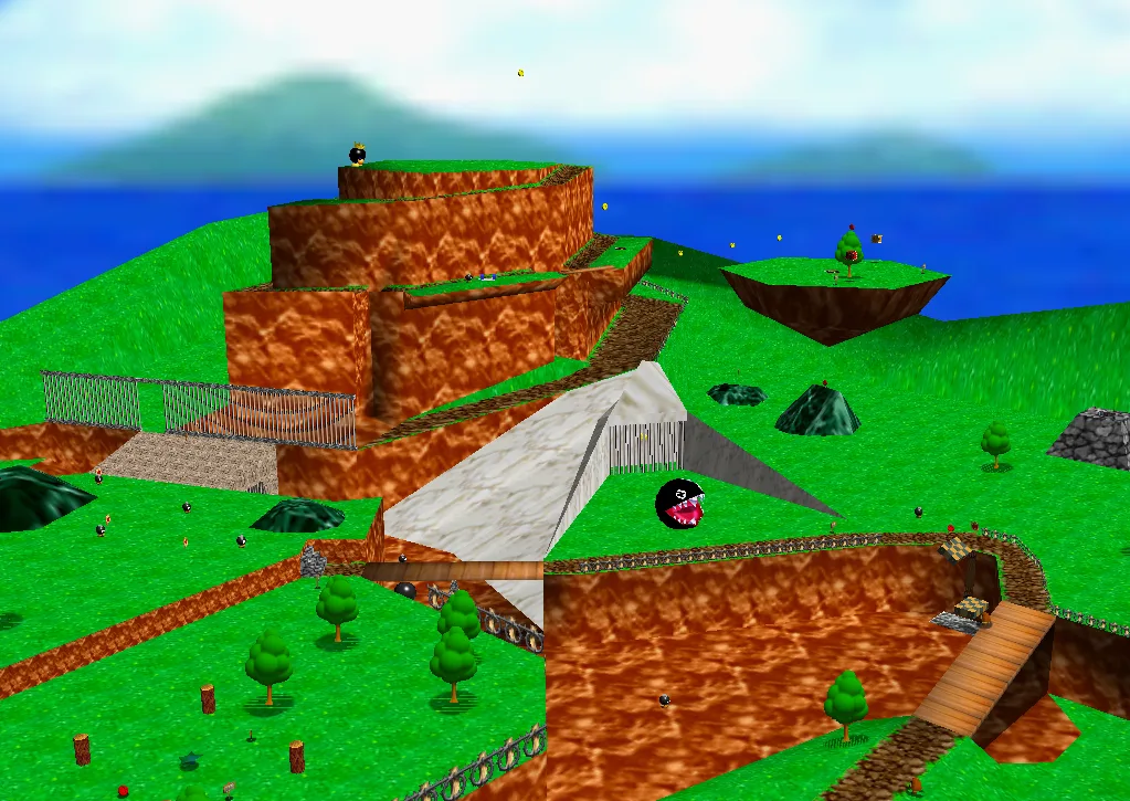 The entrance area of Bob-omb Battlefield in Super Mario 64, with the spiral mountain rising ahead and Bob-ombs patrolling the field.