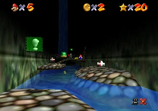 The Cavern of the Metal Cap course in Super Mario 64, the secret area holding the green cap switch behind the waterfall.