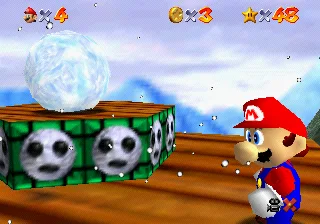The snowball that becomes the Headless Snowman's new body, sitting on its pedestal near the start of Cool, Cool Mountain in Super Mario 64, with Mario alongside it.