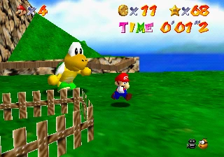 Koopa the Quick towering over Mario at the race start on the huge island, timer just past one second.