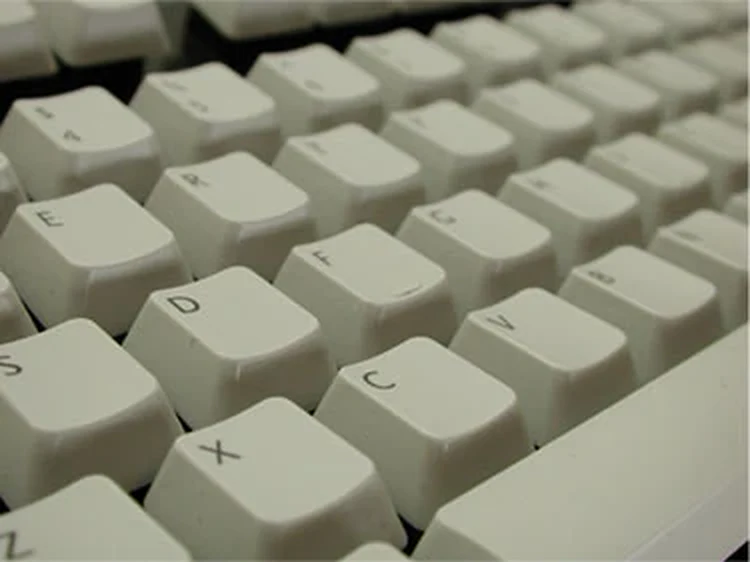 A close-up of a keyboard, the interface where finesse is won or lost one keypress at a time.