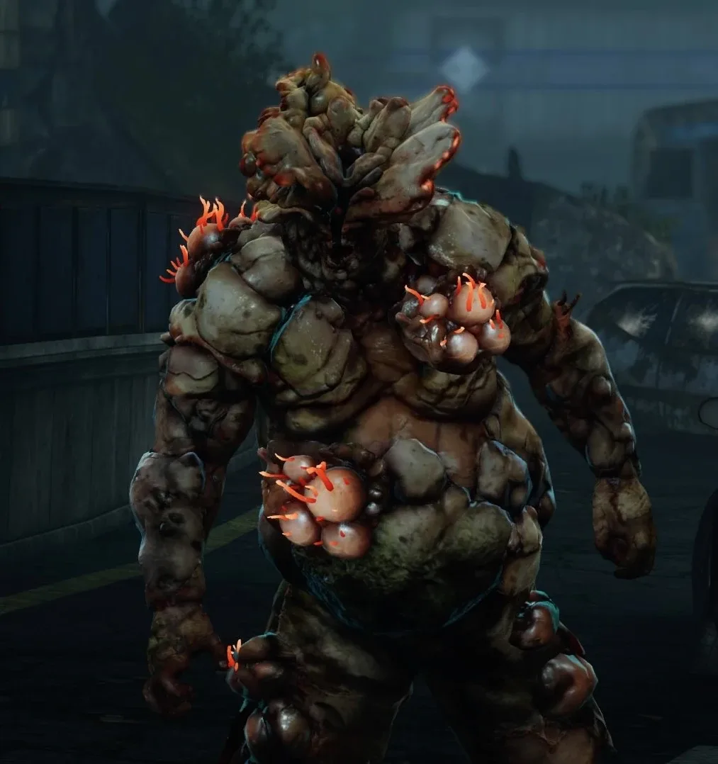 A bloater in close-up — the fourth infected stage, encased in thick bioluminescent fungal armor plating and mycotoxin pouches.