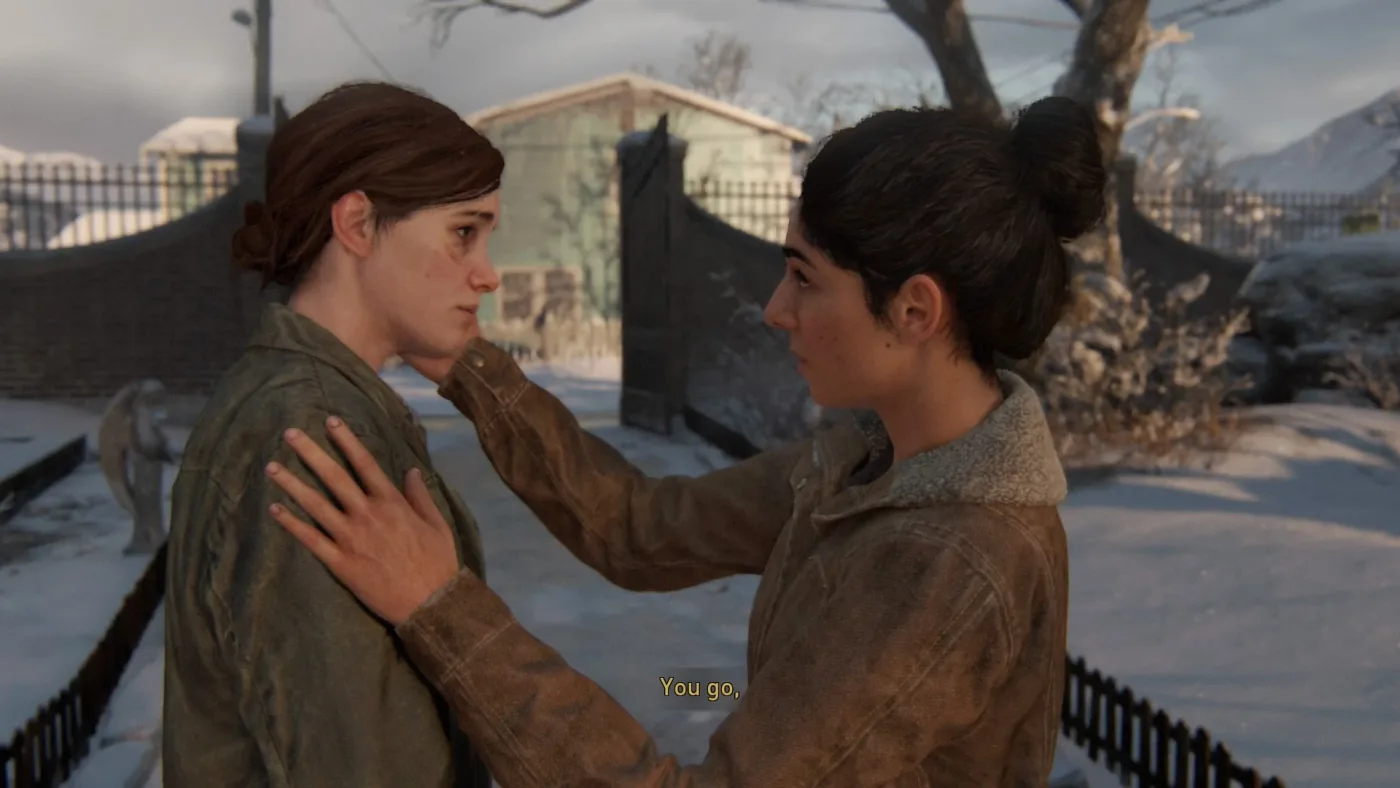 Dina comforting a shaken Ellie during their search through Seattle in The Last of Us Part II.