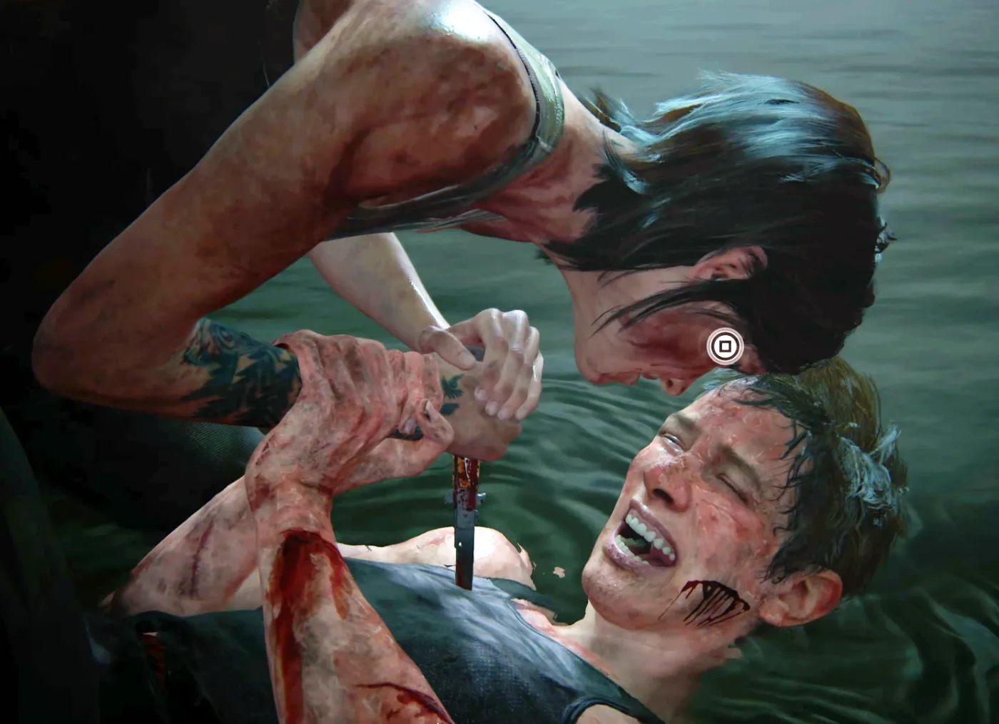 Ellie and Abby fighting in the shallows on the Santa Barbara beach in The Last of Us Part II.