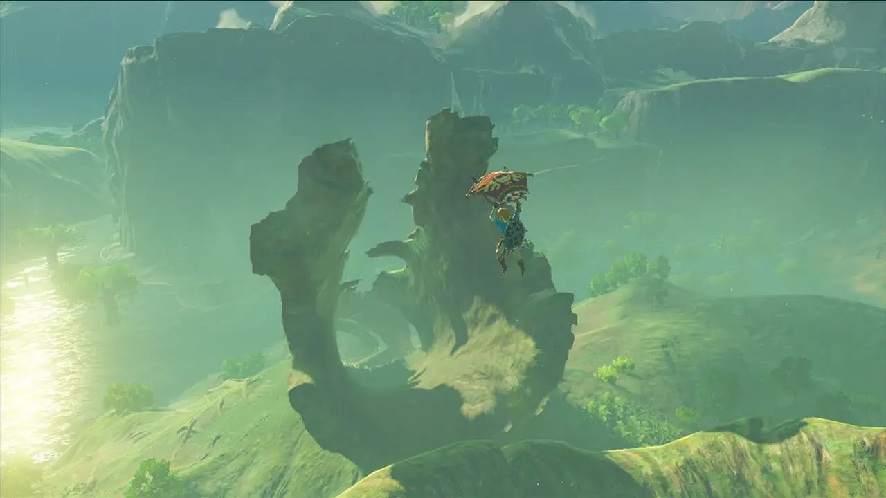 Link gliding over Hyrule with the paraglider, the item that turns every cliff into a launch point.