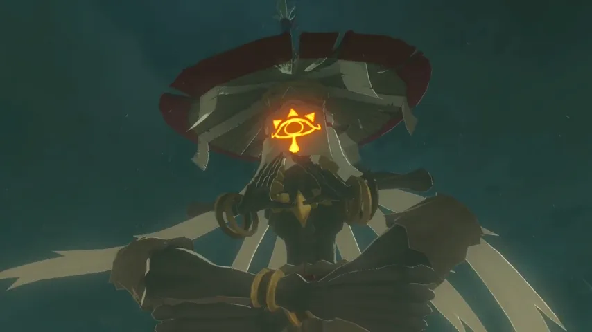 In-game model of Monk Maz Koshia from Breath of the Wild, a hovering Sheikah monk in ceremonial robes holding a glowing sword.