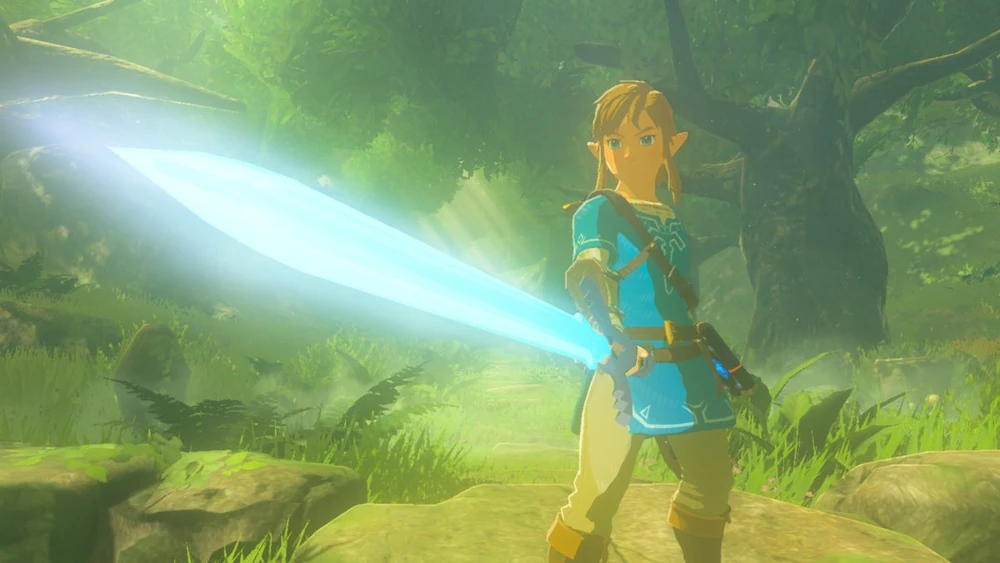 Link holding the Master Sword in Breath of the Wild with the blade glowing bright blue, sunlight streaming through the forest behind him.