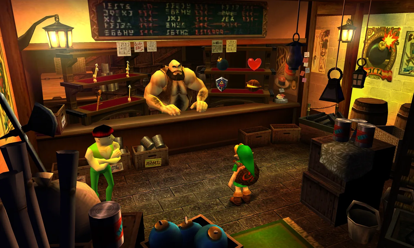 The Bazaar in Ocarina of Time 3D: a bald, bearded shopkeeper leans on the counter in front of shelves displaying arrows, a Bomb, a Recovery Heart, the Hylian Shield and Deku Nuts, while young Link and a man in a red cap and green trousers stand among crates and barrels.