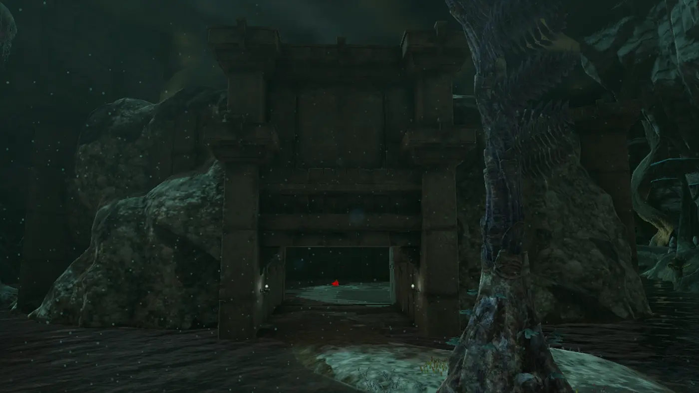 The stone gateway of the Floating Coliseum in the Central Hyrule Depths in Tears of the Kingdom, a Zonai arch flanked by lit sconces with a vast dark cavern and giant roots behind it.