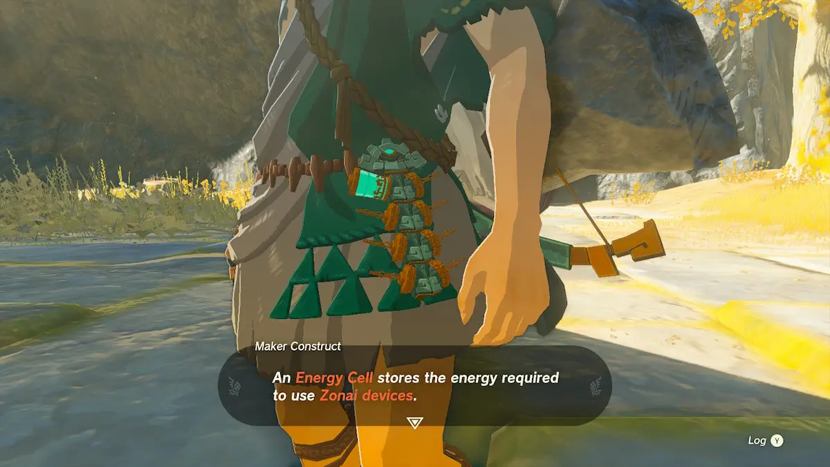 Link's Energy Cell hanging on his hip in Tears of the Kingdom while a Maker Construct explains that it stores the energy required to use Zonai devices.